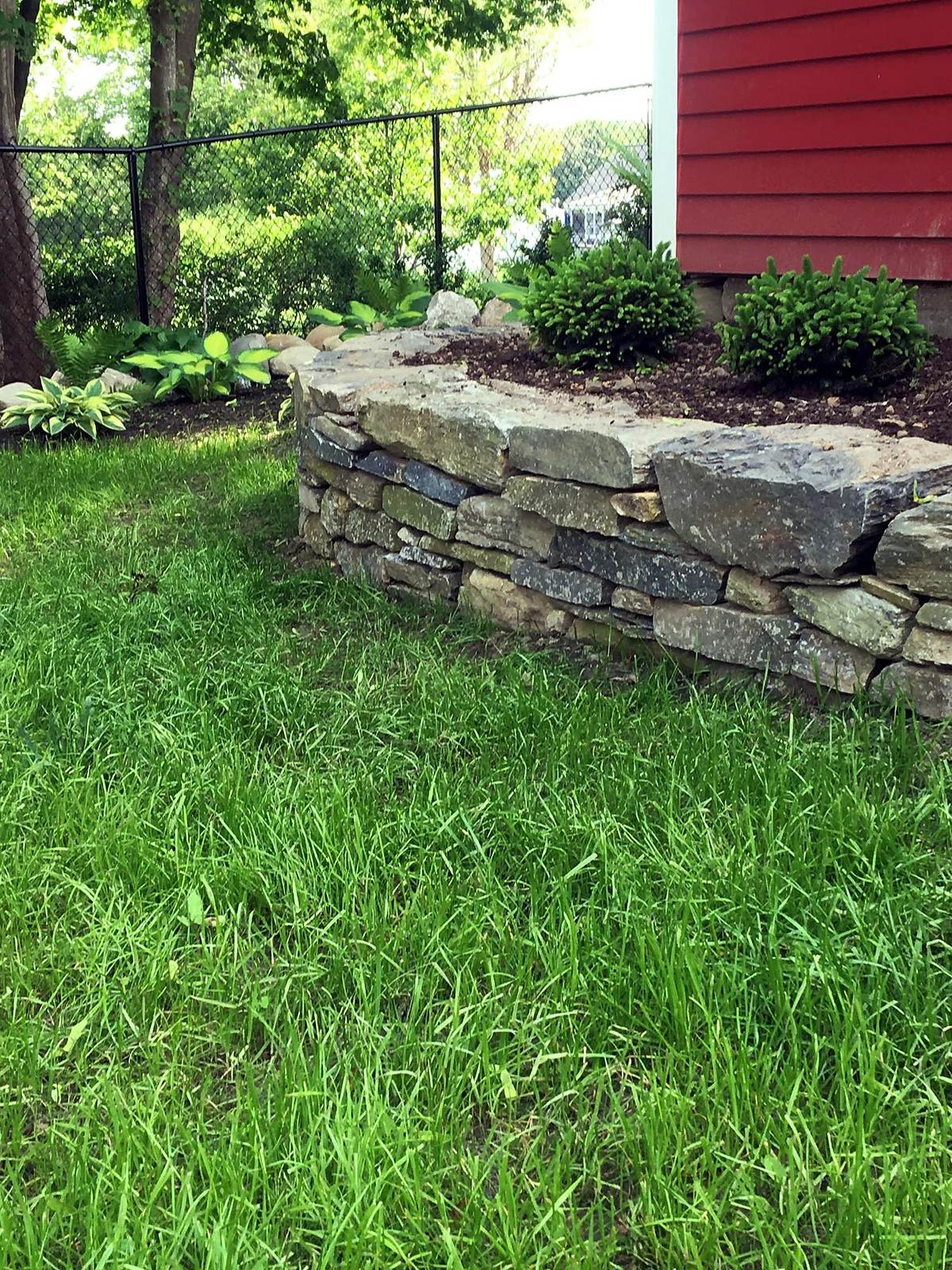 Dry-stacked stone wall