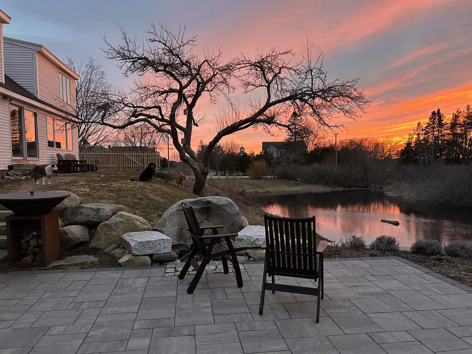 Patio at sunset with pond