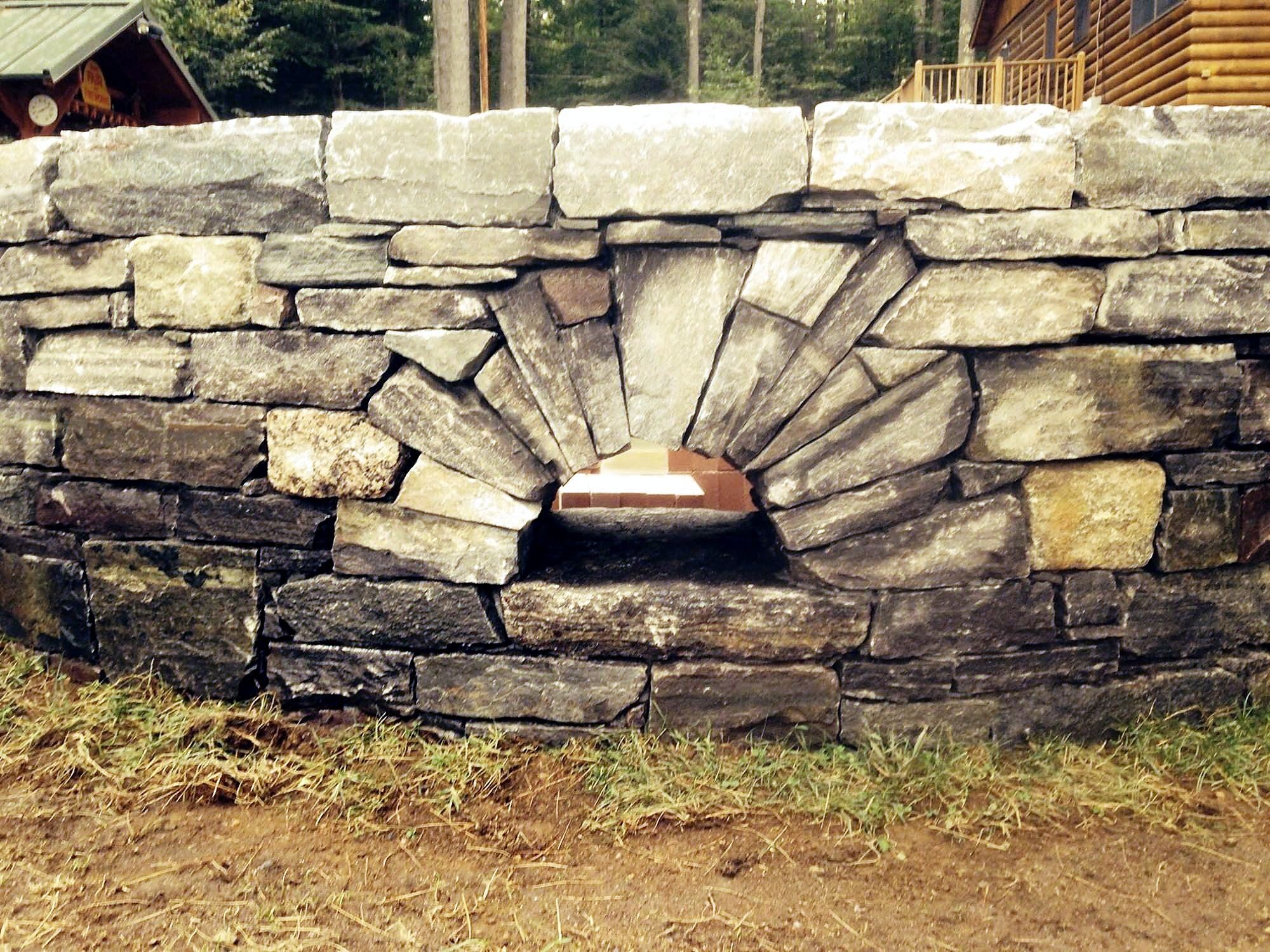 Custom stone moon fireplace, finished