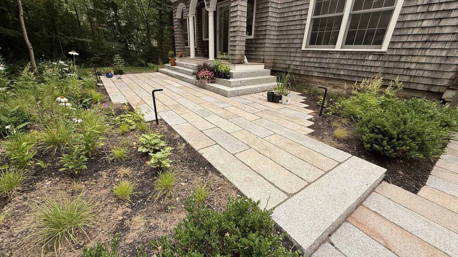 Granite walkway through the Natural & Modern garden