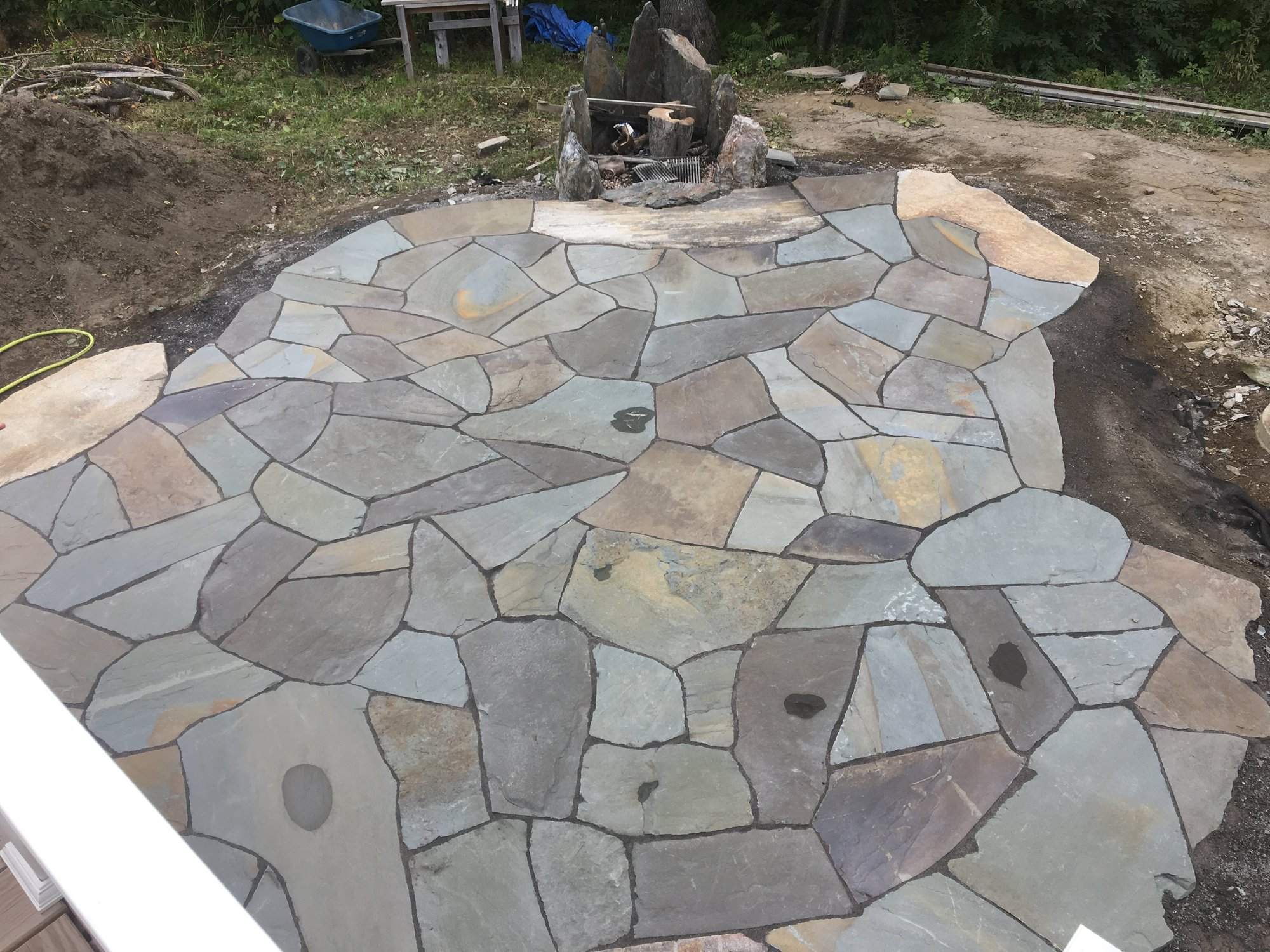 Finished paver patio and seating area