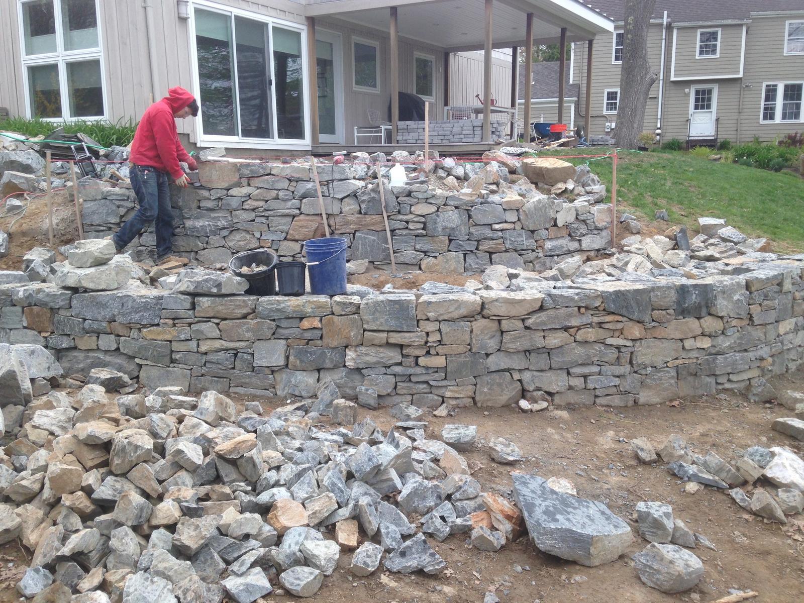 Building the curved retaining wall course by course