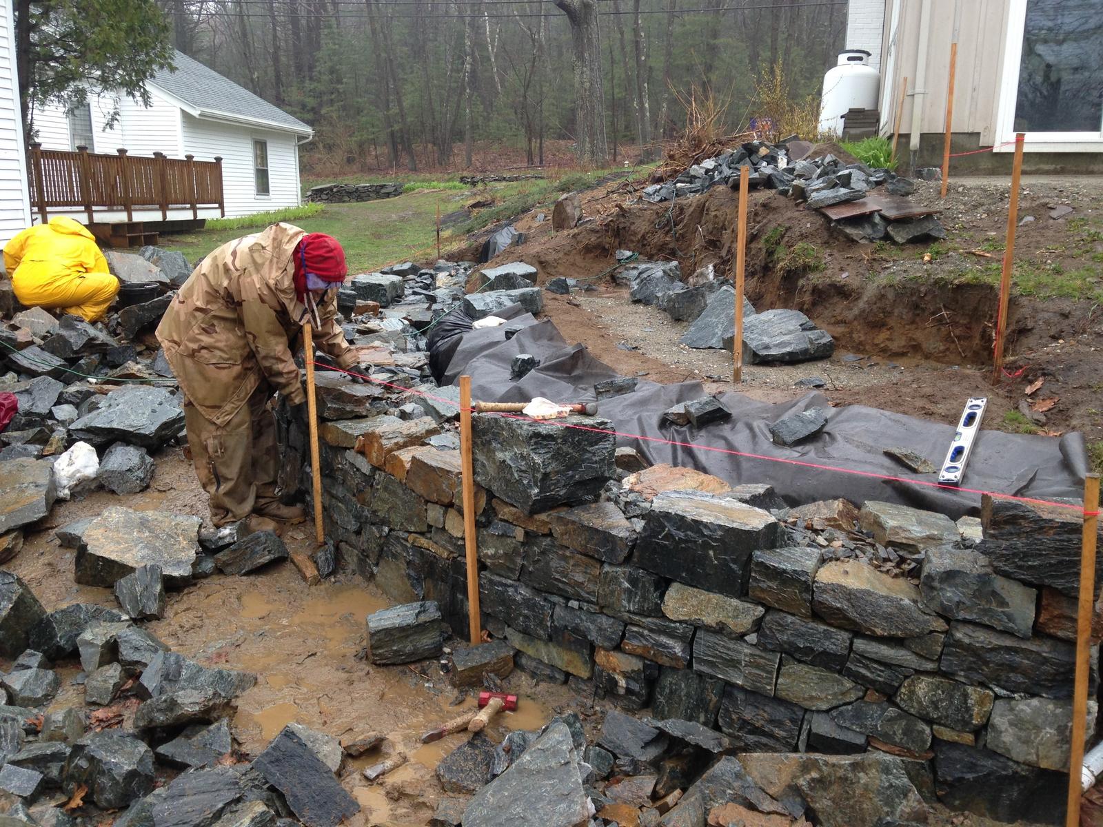 Splitting stone by hand for the wall