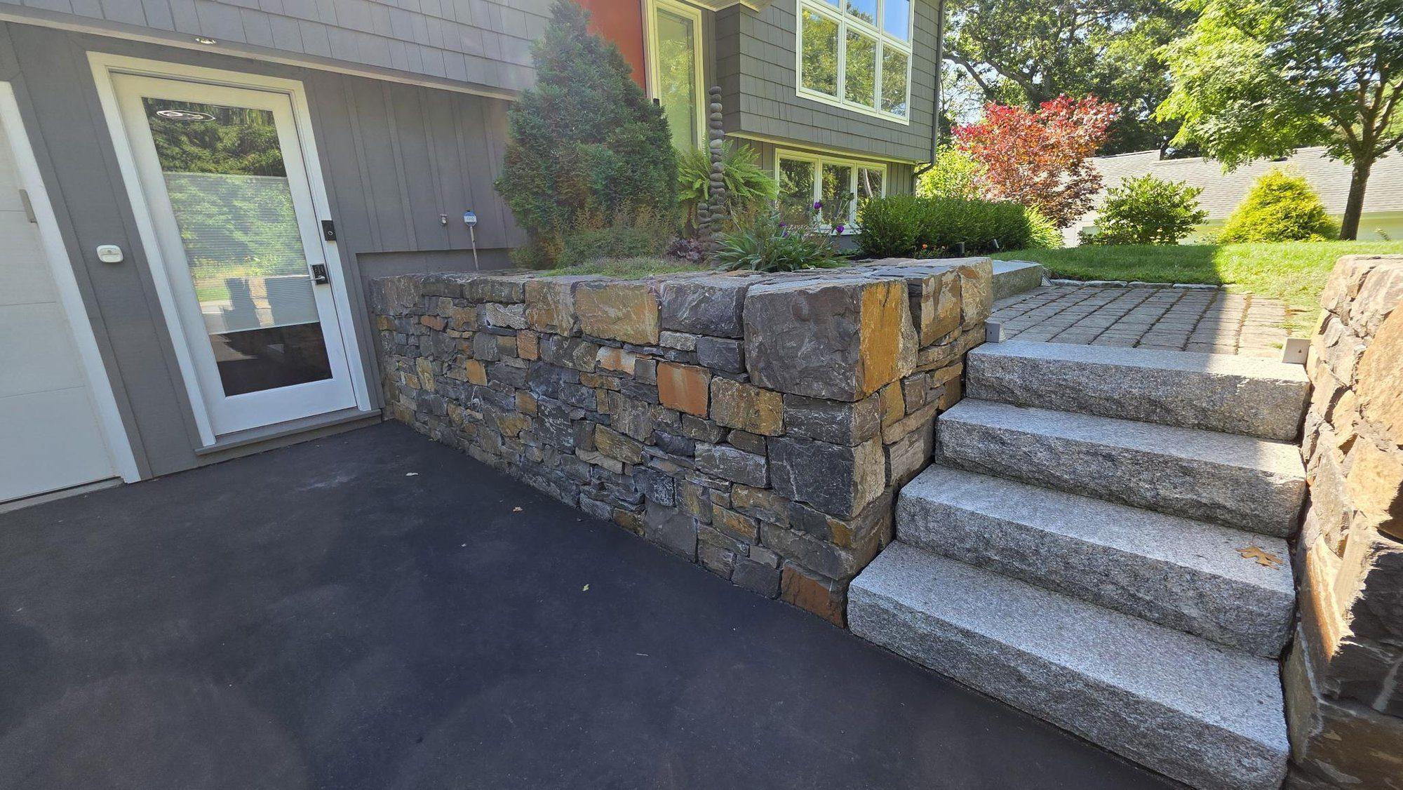 Granite steps from the top of the driveway