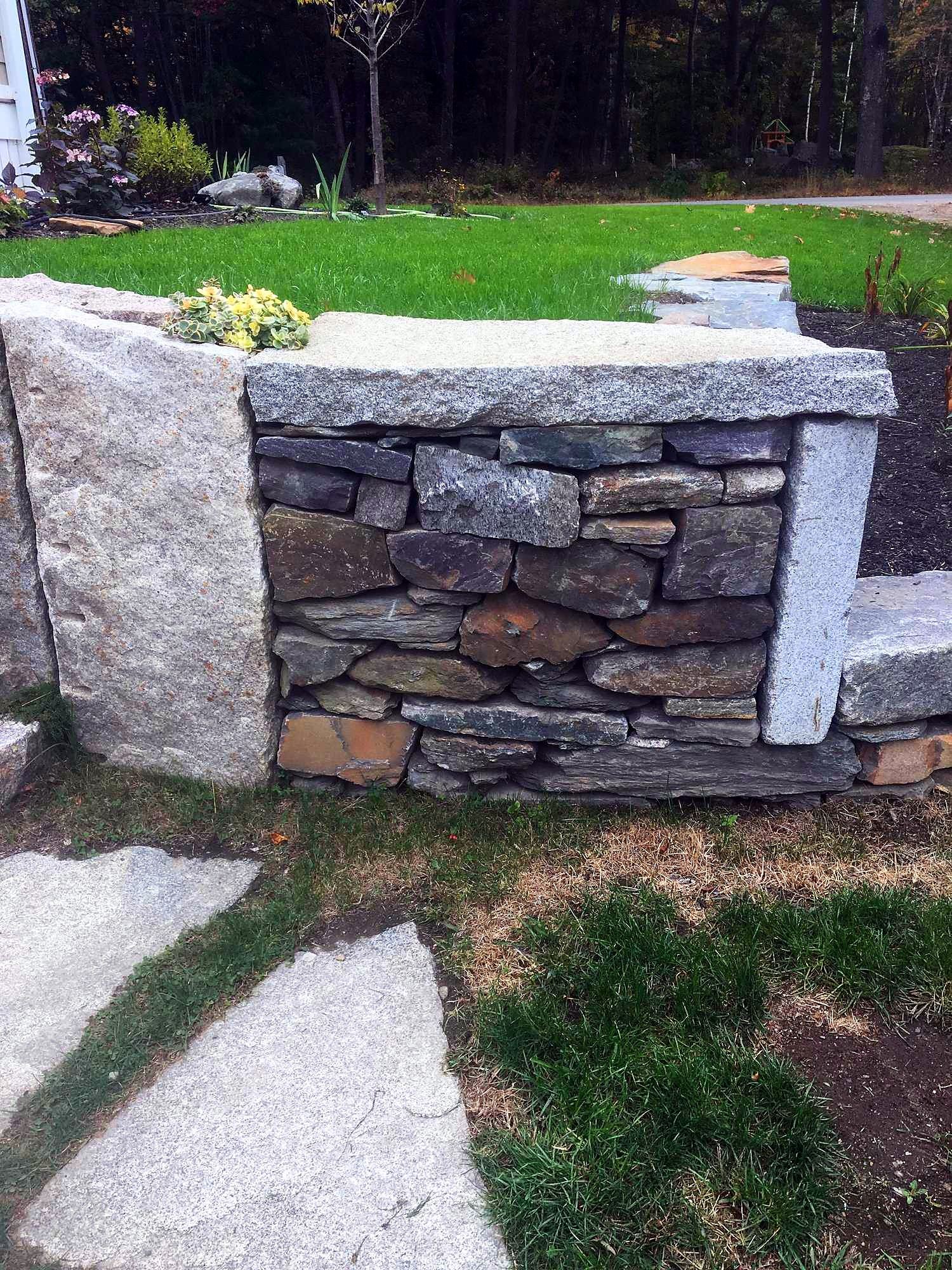 Granite-capped fieldstone wall